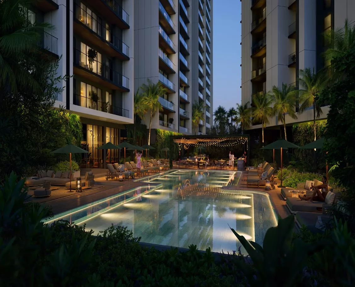 Aura Aerth exterior view with landmark towers and landscaped surroundings